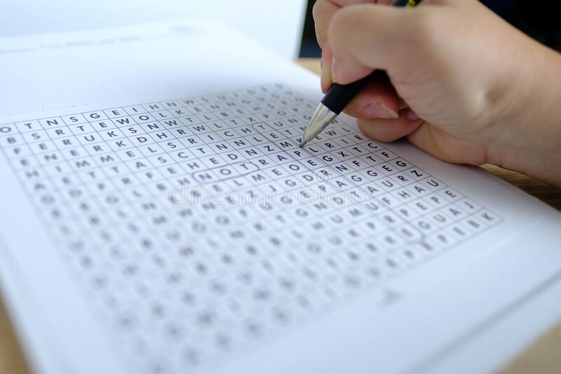 Female Hand Close up Draws Lines On Paper Spell Out And Spell Word 